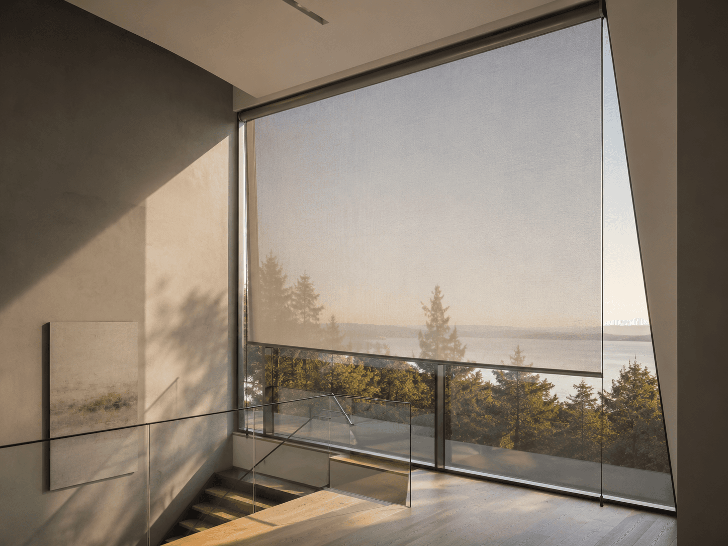 TENZA tensioned interior screen on tall atrium glazing, flat surface, even diffused daylight